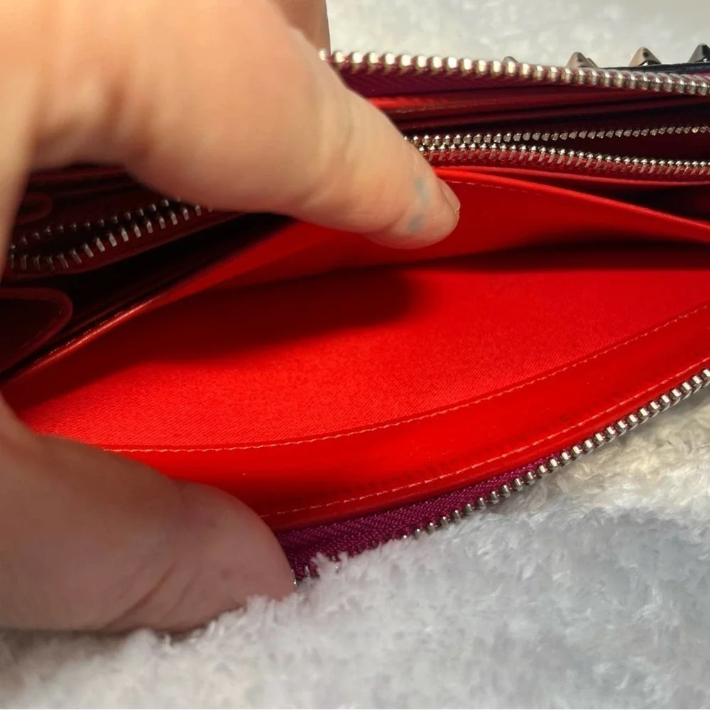 Christian Louboutin Zip Around Panetone Studded wallet in Wine Color, Leather